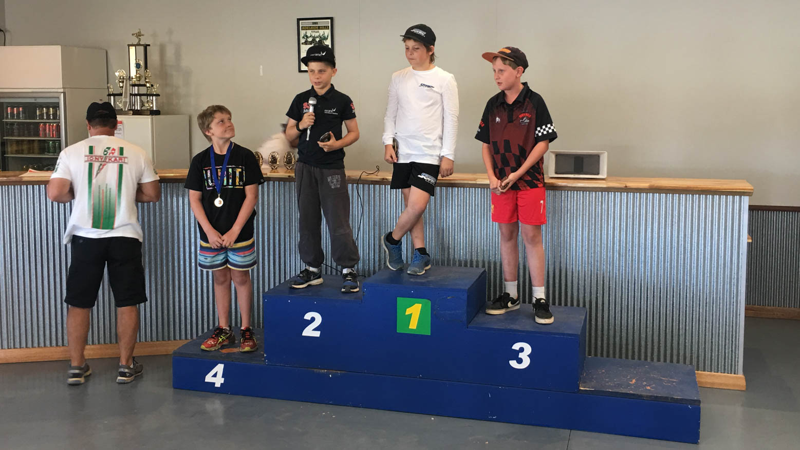 Jimmy makes a speech on the podium