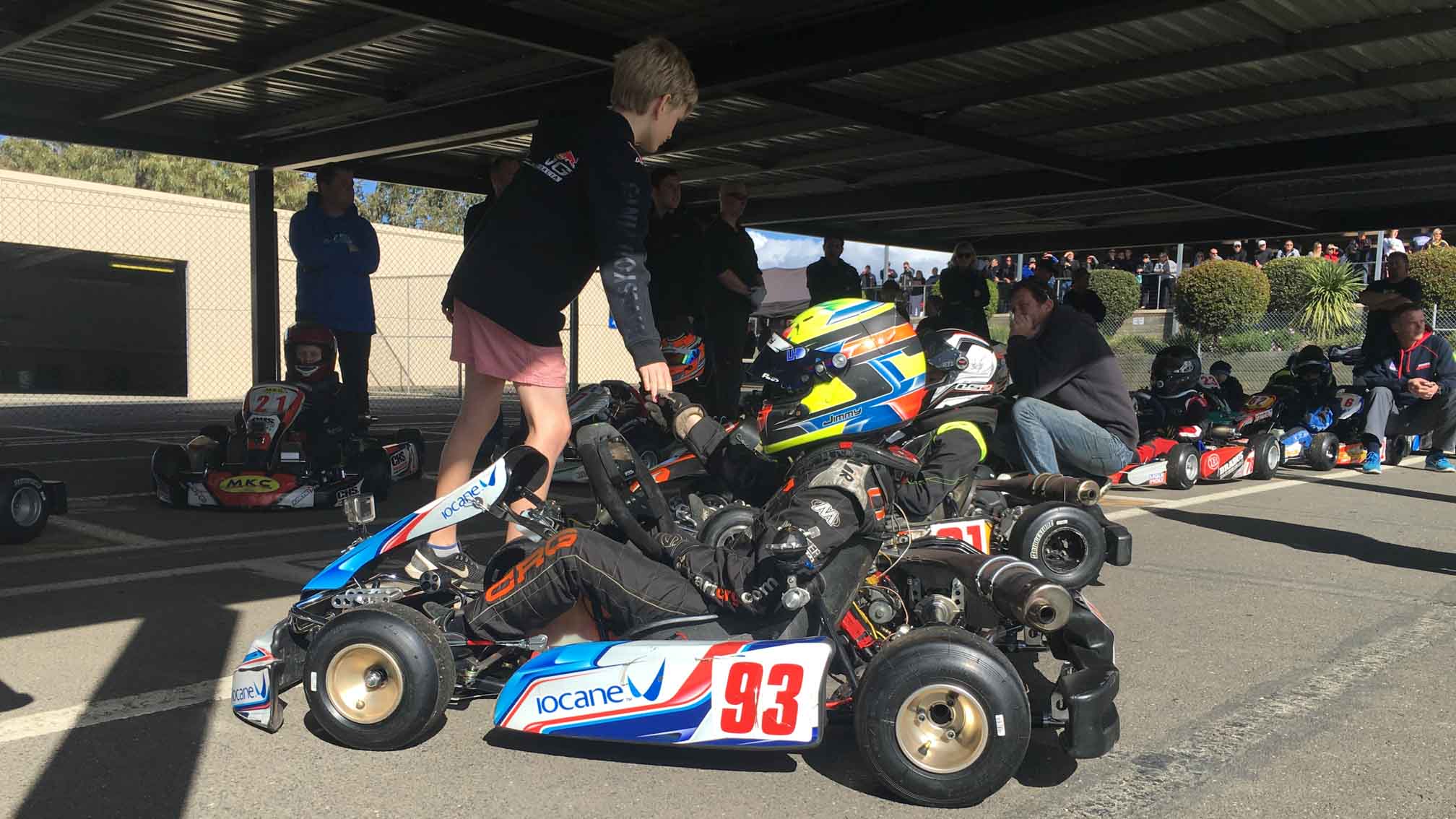 Hi random kid, fist bumping Jimmy good luck on the grid...